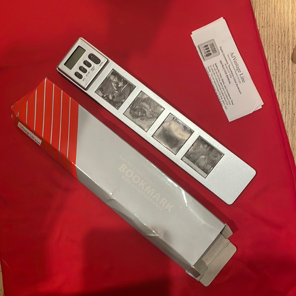Digital countdown timer/alarm clock bookmark.  With room for 4 pictures
